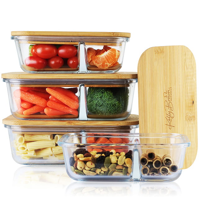 glass food containers with fruits, vegetables and snacks stacked on each other